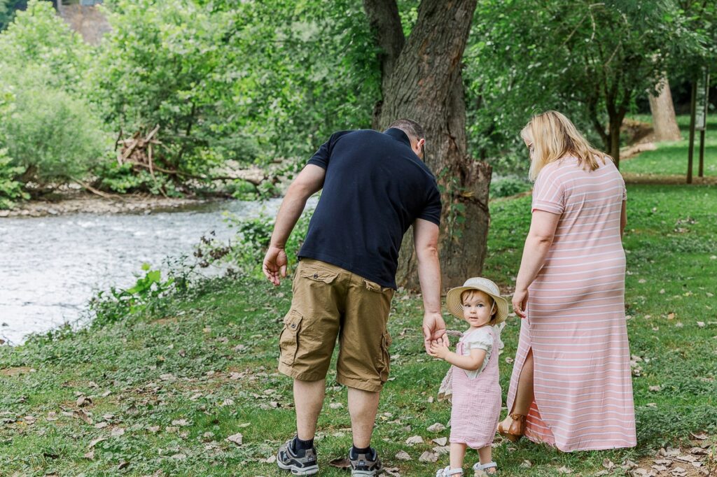 The Buckless family walking through the park, photos taken by a Virginia family photographer