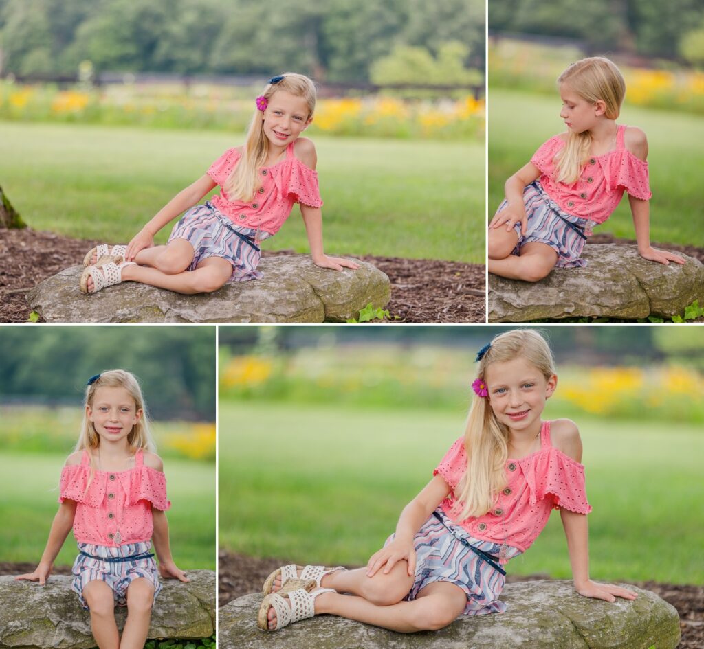 Tessa posing seated sideways on a rock for photos courtesy of photographers in Waynesboro VA